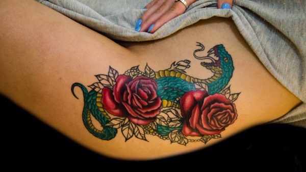Тату на бедре для девушек: эскизы, узоры, надписи, маленькие татуировки, цветы, животные, драконы, розы. Фото